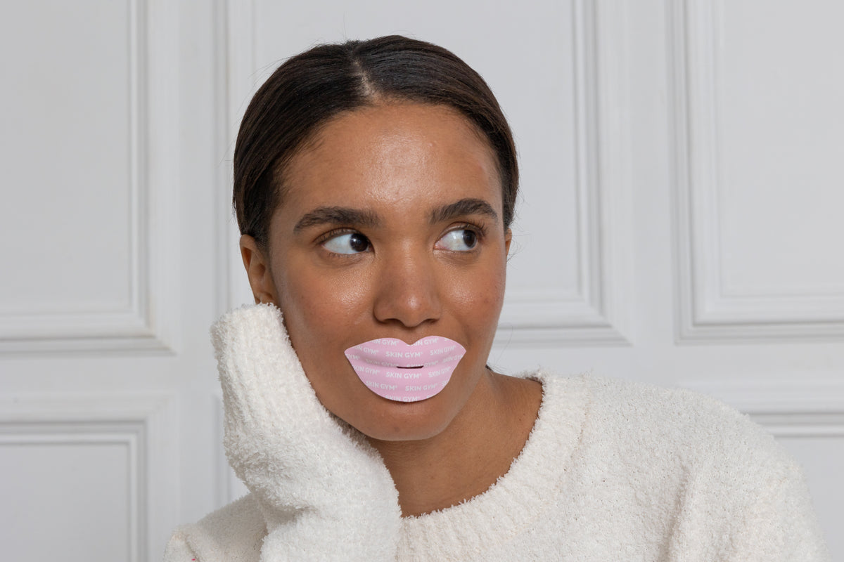 Girl using Skin Gym's mouth tape